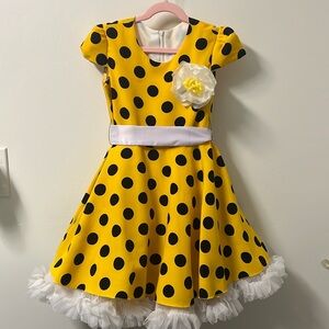 Girls yellow polkadot dress size Small (5)
Years)